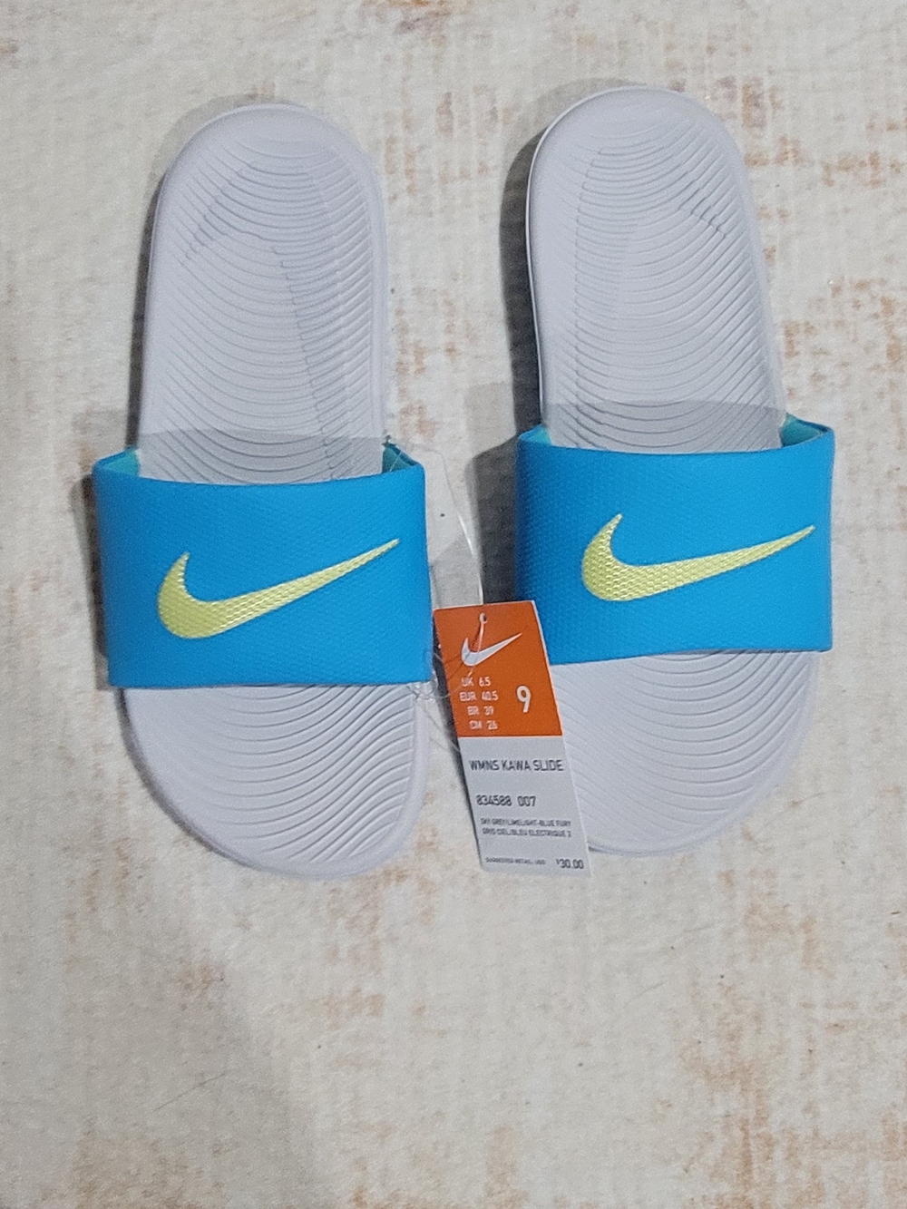 Nike Women’s Slide Sandals Blue with Yellow Swoosh